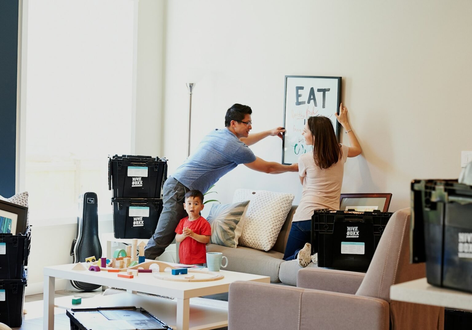 Family unpacking new home